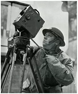 Images Dated 30th July 2019: Cinematographer adjusts his camera, September 1939