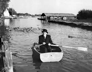Ducks Collection: City gent - rowing boat
