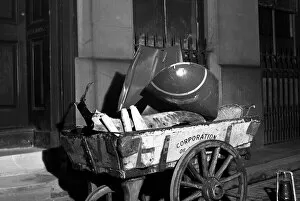 Bombed Gallery: City of London handcart with scrap bomb metal, WW2