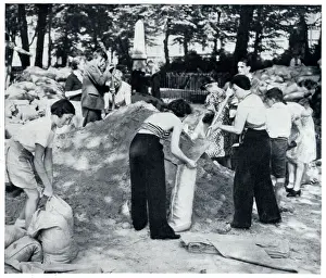Sandbags Prints: Civilians filling sandbags for air raid shelters 1939