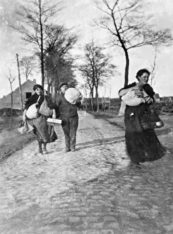 Cobble Stones Collection: Civilians fleeing their village, Oostvleteren, Belgium, WW1