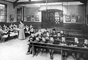 Urchins Prints: Classroom in school Victorian period