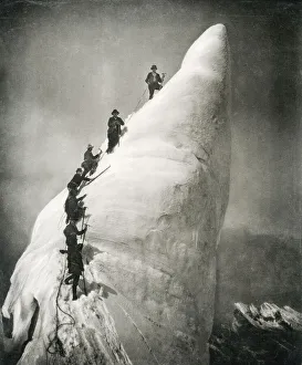 Climbing a serac, glacier pinnacle, in the Alps