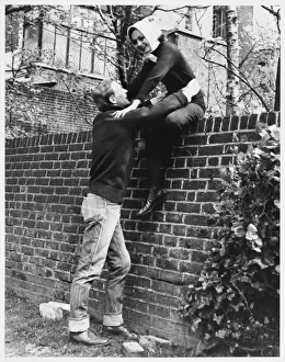 Climbing over a Wall