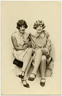 Waved Prints: Two close lady friends in stylish attire