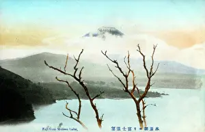 Fuji Prints: Cloud-encircled peak of Mount Fuji from Lake Motosu, Japan