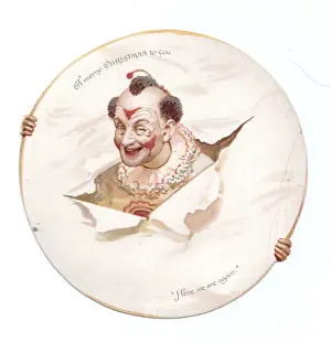Clown with head through paper on a Christmas card