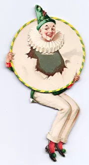 Clown with head through paper hoop on a greetings card