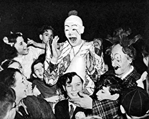 Clowns and children at the circus, 1948