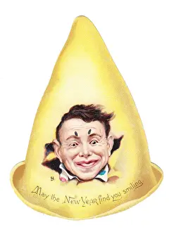 Clowns face on a hat-shaped New Year card