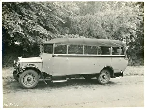 Coach on A2 long, Wadham. Open-top single-decker bus