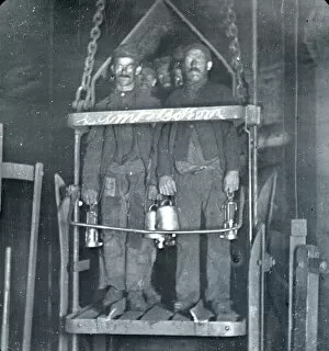 Mine Gallery: Coal miners in shaft lift, South Wales