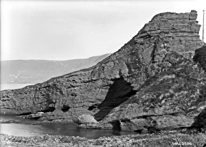 Coastal scene showing some geological feature on the sandsto Coastal scene showing some geological feature on the sandsto
