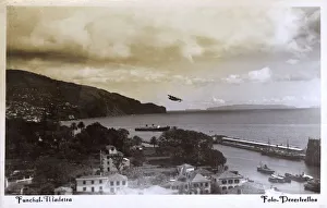 Madeira Gallery: Coastal view of Funchal, Madeira with seaplane taking off
