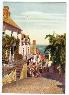 Cobbled Collection: Cobbled main street Clovelly looking towards the sea