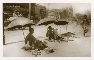 Cobblers on the street, Delhi, India