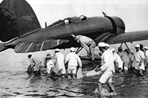 Aircrafts Gallery: Col and Mrs. Lindbergh being aided with their aircraft
