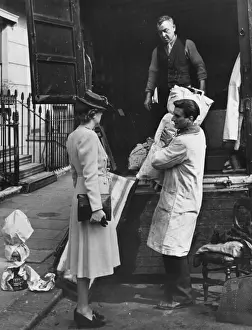 Collecting articles to furning refugee houses WWII