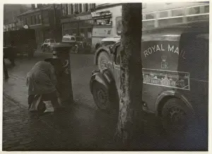 Posting Prints: Collecting the mail on Christmas Eve - Ashley Street, London