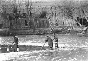 Collecting water in Kashgar, western China