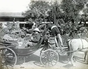 Colonial British men in carriage, India