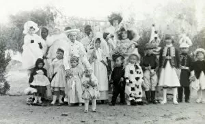 Colonial children in fancy dress with Indian nannies