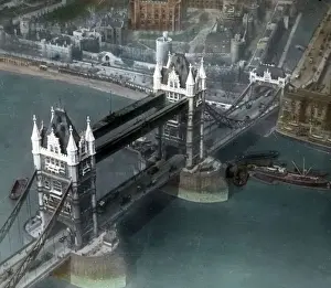 A coloured aerial view of Tower Bridge London looking south