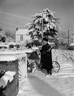 Shine Prints: Come rain or shine, or snow... this dedicated English postman delivers letters in
