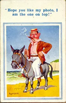 Boater Prints: Comic postcard, Man with donkey on the beach Date: 20th century