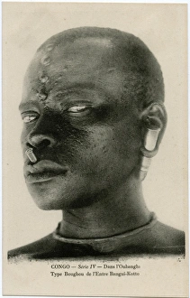 Congo, Africa - Terrifying Warrior with bullet piercings Congo, Africa - Terrifying Warrior with bullet piercings