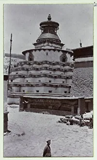 Two connected buildings at Gyantse - the Kumbum, a multi-storied set of Buddhist chapels, with the Palcho Monastery partially visible (R), from a fascinating album which reveals new details on a little-known campaign in which a British military