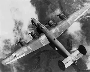 Consolidated Prints: Consolidated B-24D (aft) aloft from hard above of 32