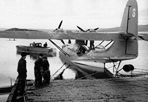 Berthed Collection: Consolidated PBY Catalina (aft) berthed in Soviet servi