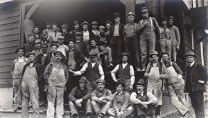 Shabby Gallery: Construction workers outside a large building, USA