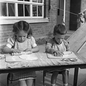 Aprons Prints: Cookery education, 1955