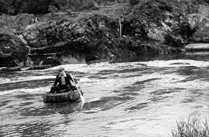 Cenarth Prints: Coracle on River Teifi at Cenarth, Wales