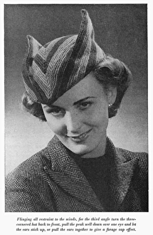 Knits Gallery: Three cornered knitted hat, circa 1941