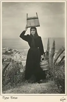 Hilltop Prints: Corsica - Corsican woman with bucket on her head