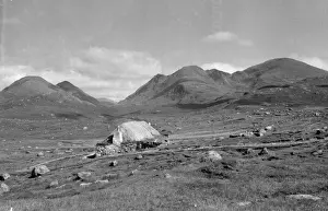 Cottage in a bleak Scottish landscape