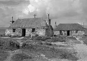 Thatching Prints: Cottage buildings in remote landscape