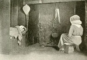 Cottage interior with mother and sleeping child, Devon