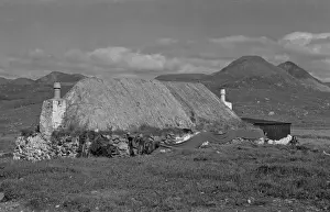 Cottages in a bleak Scottish landscape