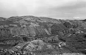 Cottages in a bleak Scottish landscape