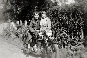 Registration Prints: Couple with a 1938 Ariel Red Hunter motorcycle