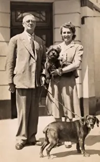 Couple with two dogs