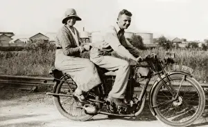 Registration Prints: Couple on an early 1900s vintage motorcycle, 1900s