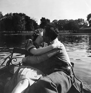 Images Dated 11th January 2012: Couple kissing on boating lake