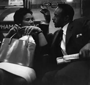 Couple on a London underground train