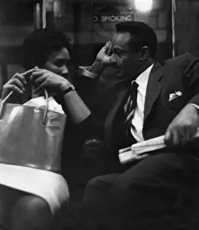 Couple on a London underground train
