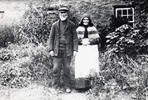 Couple outside cottage, Pembrokeshire, South Wales